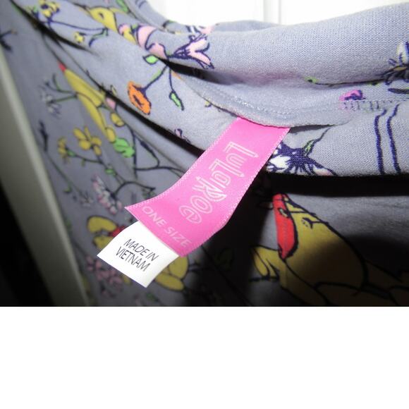 Pair of LuLaRoe Purple Pooh Bear and striped leggings - Picture 4 of 7